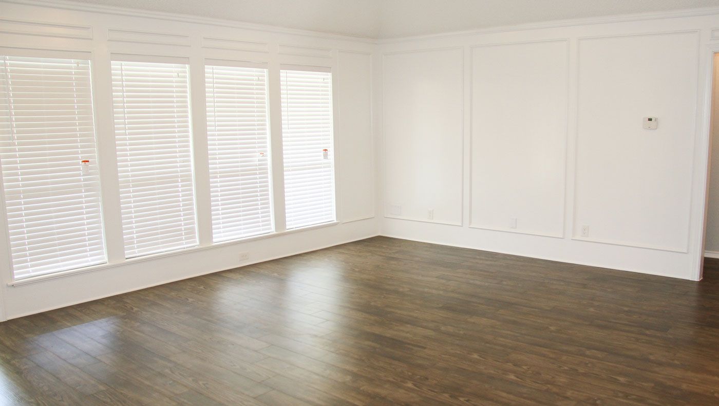 Newly painted room with varnished flooring